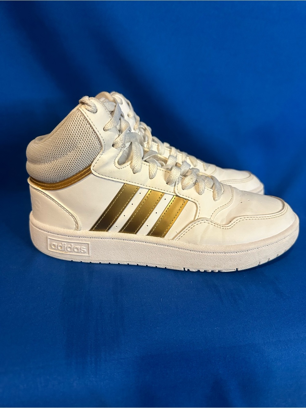 adidas White High-Top Sneakers with Gold Stripes